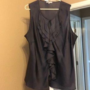 Satin like sleeveless blouse